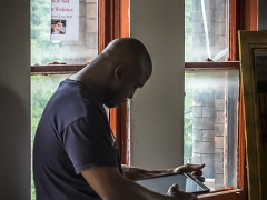 Terrance Blount Reads From His iPad At The July CAAAP Meeting - 
Image by Michael Bracey
