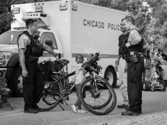 Child-On-Bike-With-Policeman