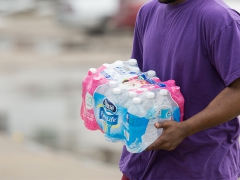 Flint Michigan-Resident Receiving Water.
Image by Foster Garvin