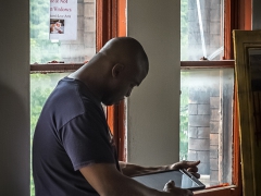 Terrance Blount Reads From His iPad At The July CAAAP Meeting - 
Image by Michael Bracey

